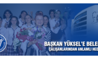 Başkan Yüksel’e çalışanlarından anlamlı hediye